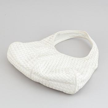 Bottega Veneta, a white intrecciato leather hobo bag.