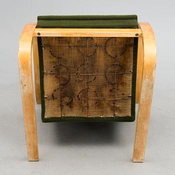 A Mid-20th Century open Armchair model 36/401 for Artek, Finland.