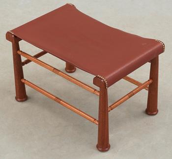 A Josef Frank mahogany and brown leather stool, Svenskt Tenn, model 972.