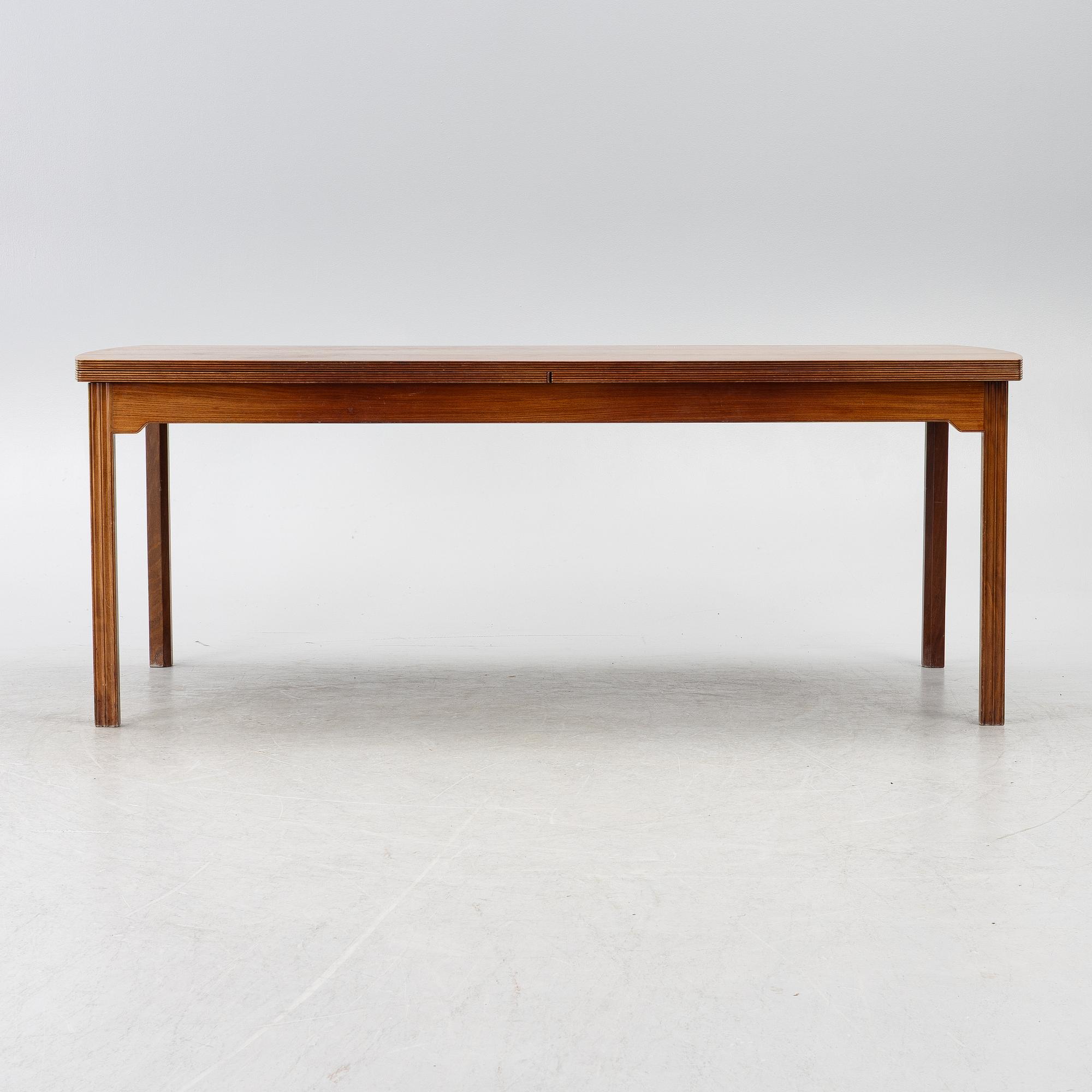 A Skandivanian dining table, 1950's/60's.