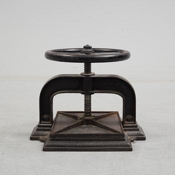 A cast iron book press from around year 1900.