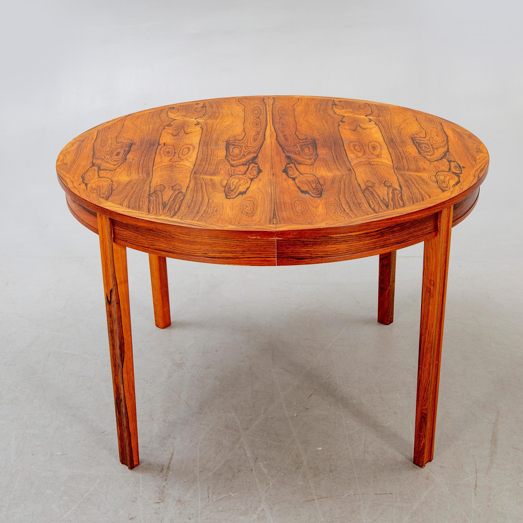 A Swedish 1960s jacaranda dining table,