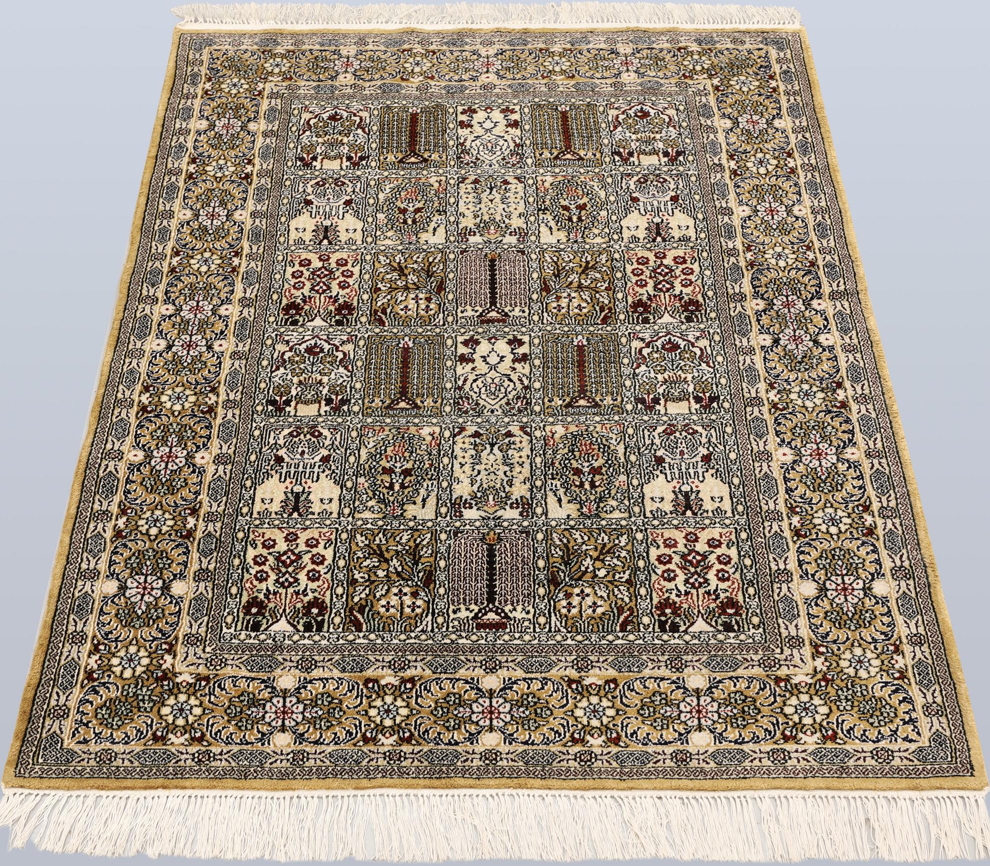 An Oriental silk rug, approx. 122 x 79 cm.