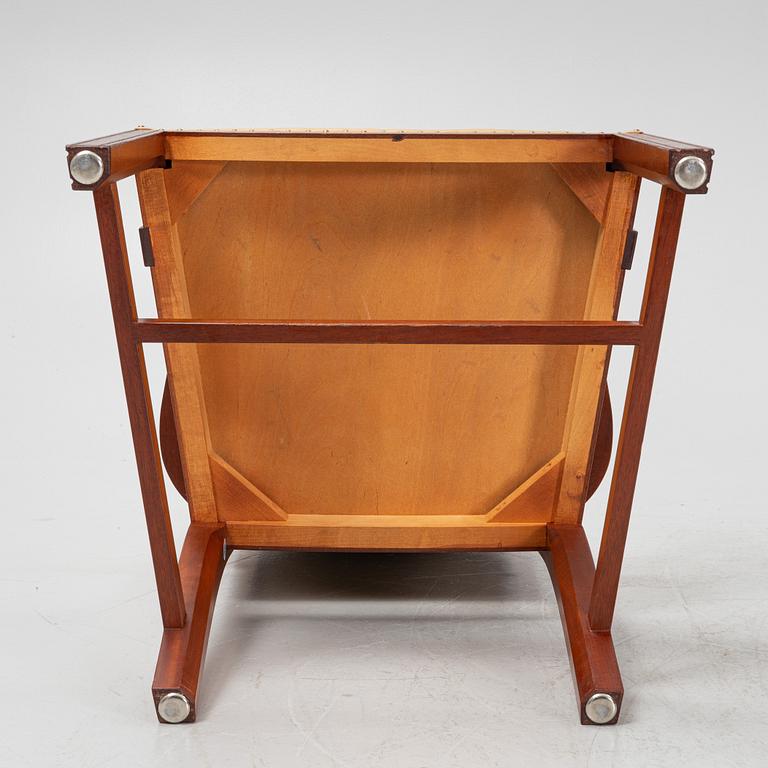 A par of stained beech wood armchairs, end of the 20th Century.