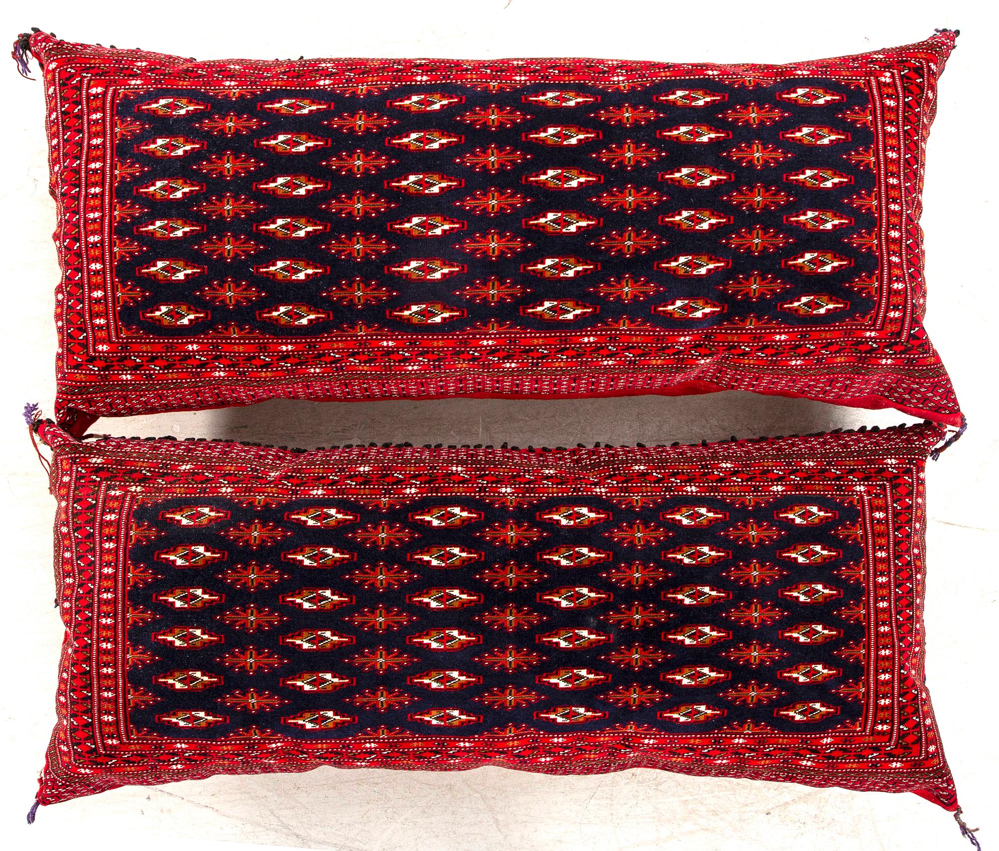 A pair of Tekke Turkmen cushions 125x58 cm each.