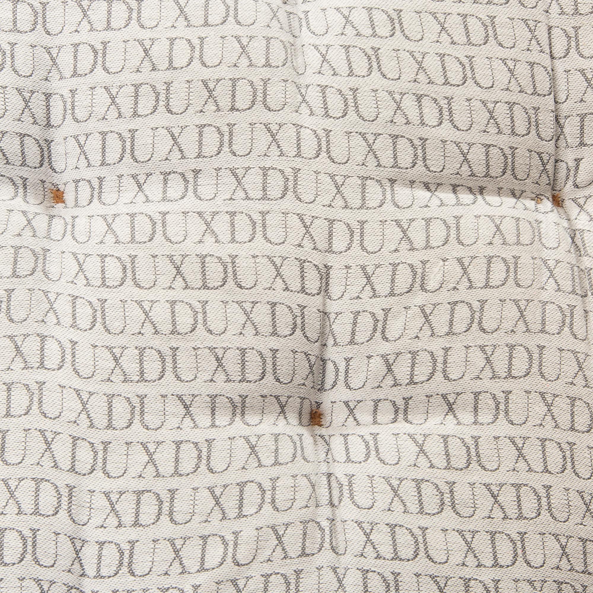 A Bruno Mathsson "Pernilla" leather easy chair for DUX later part of the 20th century.