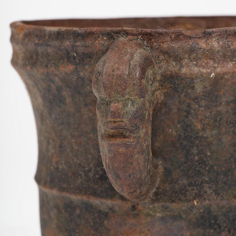 A pair of Swedish cast-iron garden urns, 18th century.