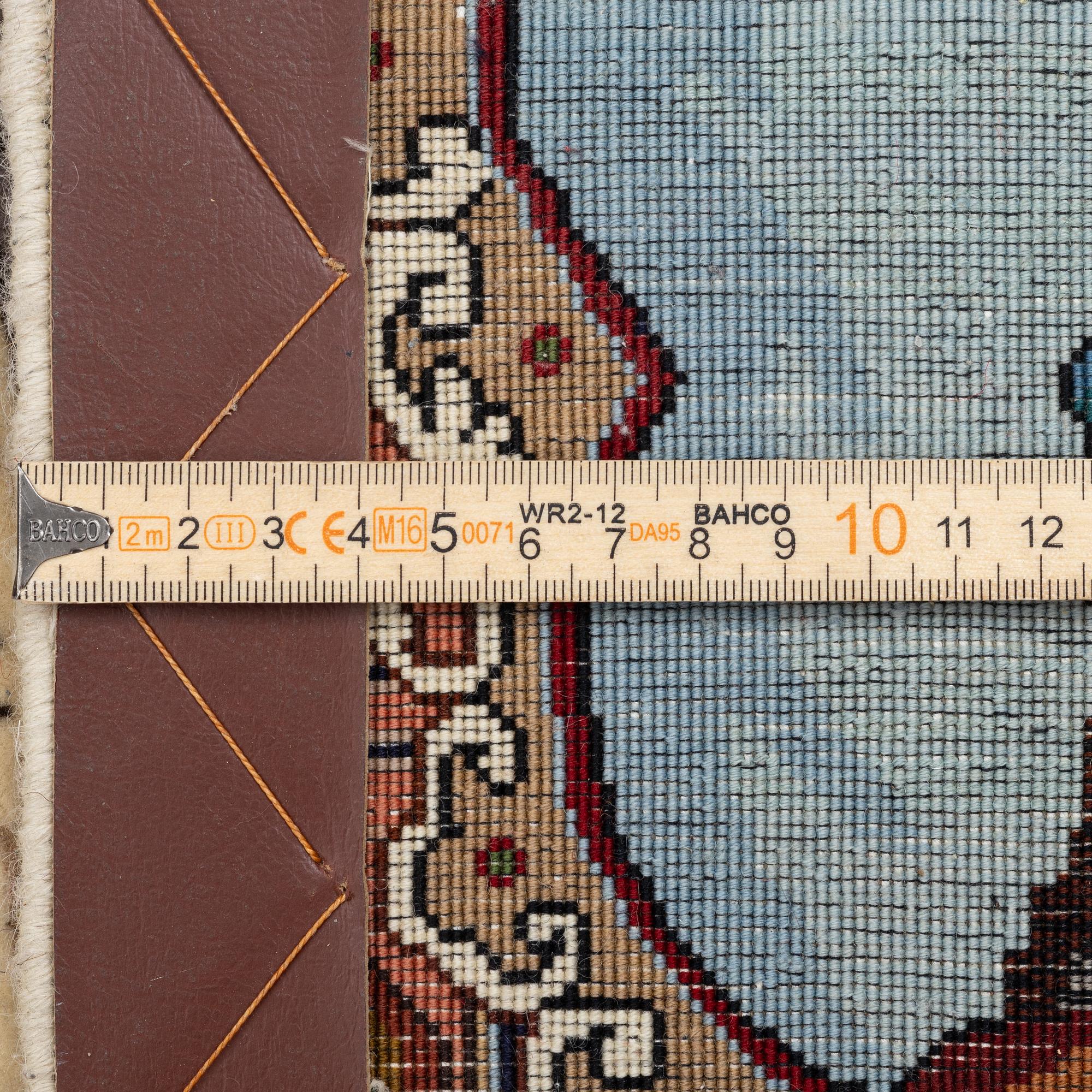 A Tabriz carpet, c. 199 x 151 cm.