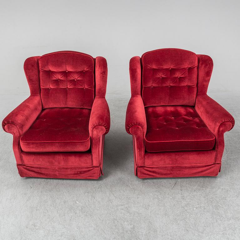 Apair of easy chairs.