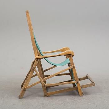 a mid 20th century deck chair.