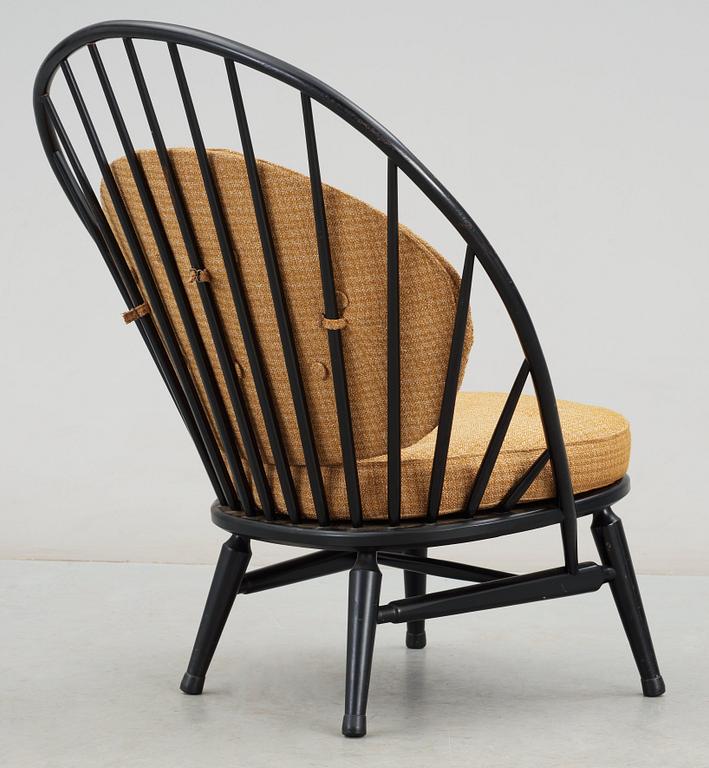 A Sven Engström & Gunnar Myrstrand black lacquered easy chair, 'Bågen', Nässjö Stolfabrik, Sweden 1950's.