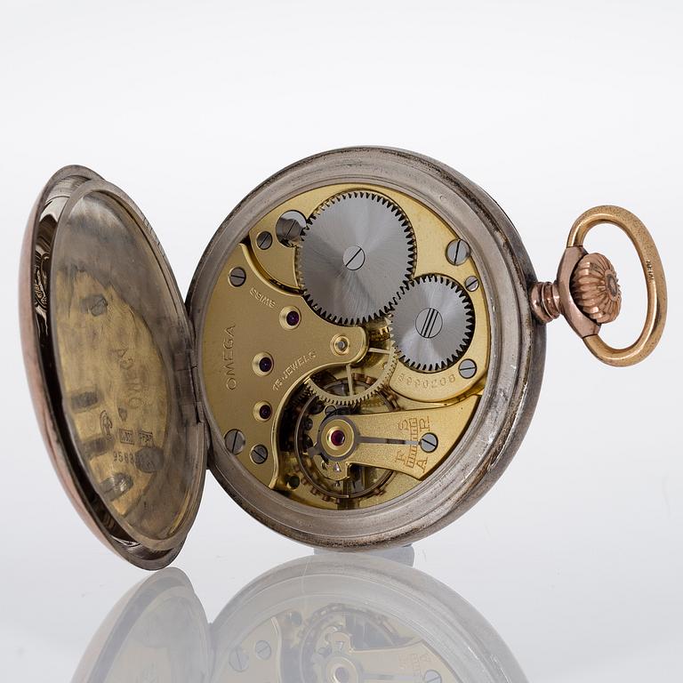 TASKUKELLO, Omega, hopeaa, 1900-luvun alku halkaisija noin 5 cm.