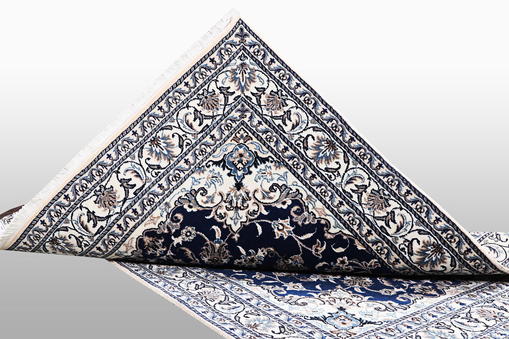 A carpet, Nain, part silk, ca 202 x 148 cm.