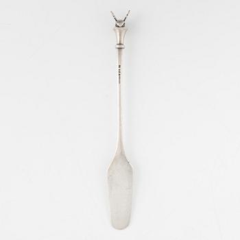 A silver honey spoon designed by Barbro Littmarck for W.A Bolin, Stockholm 1965.