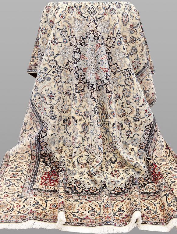 A Nain carpet, part silk, so-called 6LAA, c. 310 x 211 cm.