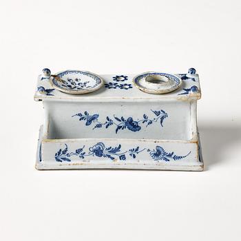 A Swedish Rörstrand faience desk set, dated Stockholm 22/11 1745.