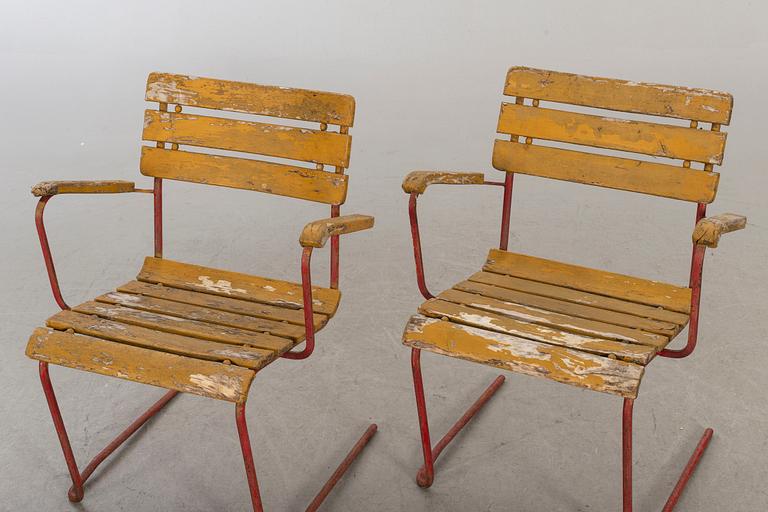 A mid 20th century Garden armchairs, easy chair and a table, Bjärnum, Sweden.