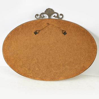 A Swedish Grace pewter mirror, 1920s/30s.