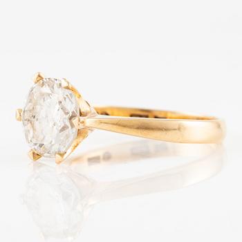 Ring 18K gold with a round brilliant-cut diamond.