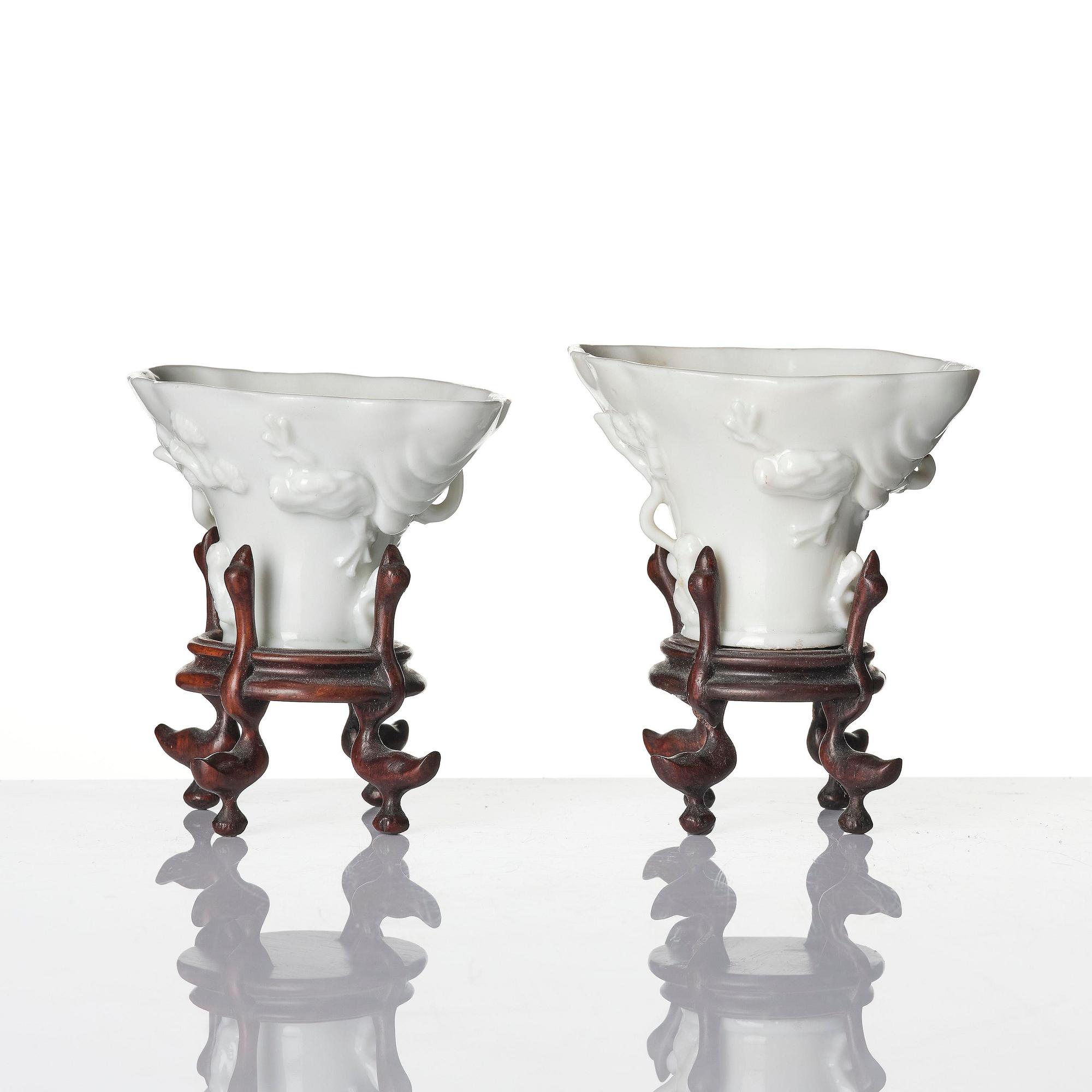 Two blanc de chine rhinoceros libation cups, Qing dynasty, Kangxi (1662-1722).