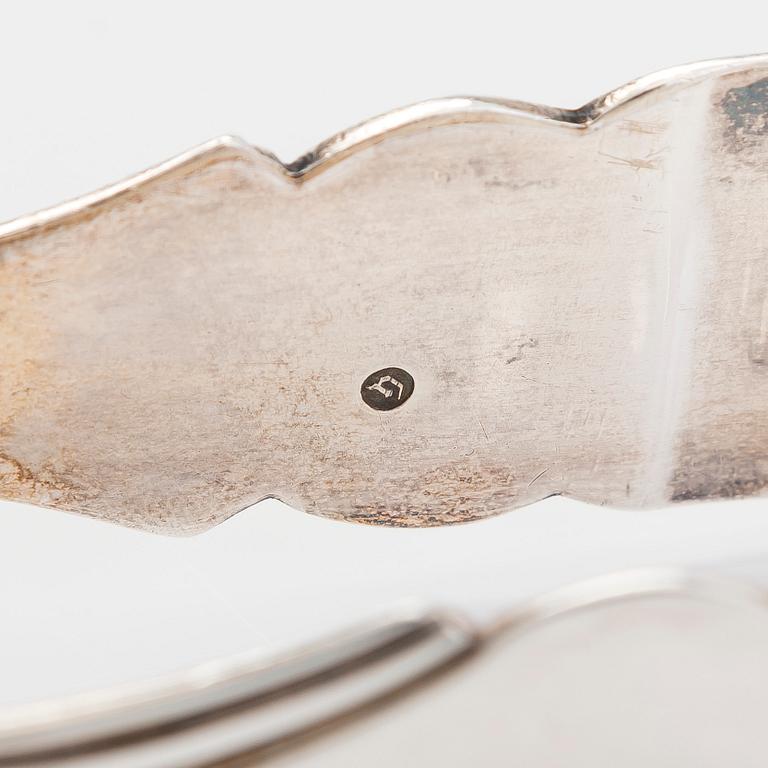 Serving cutlery, 3 pcs, silver, Netherlands 1883-1975, and a pair of silver cheese buttons, Finland 1971.