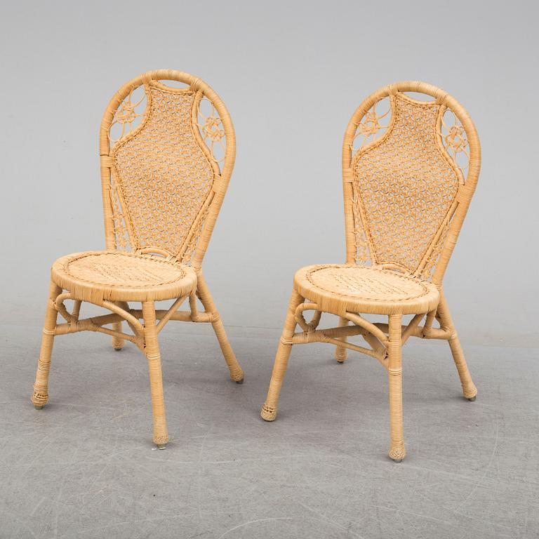 A pair of second half of the 20th cnetury rattan chairs.