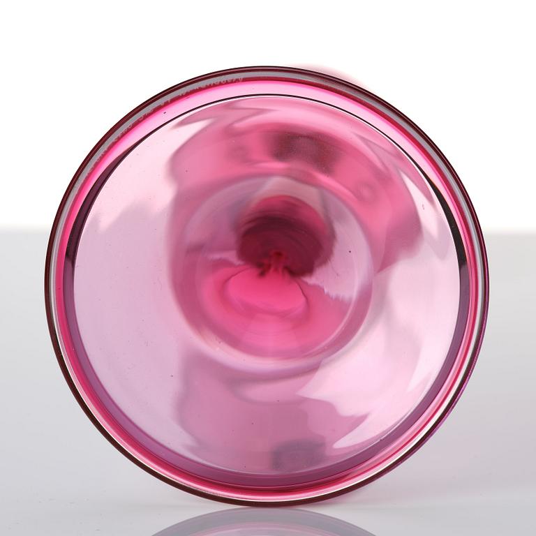 Nils Landberg, a cerise tinted glass goblet, Orrefors Sweden 1957.