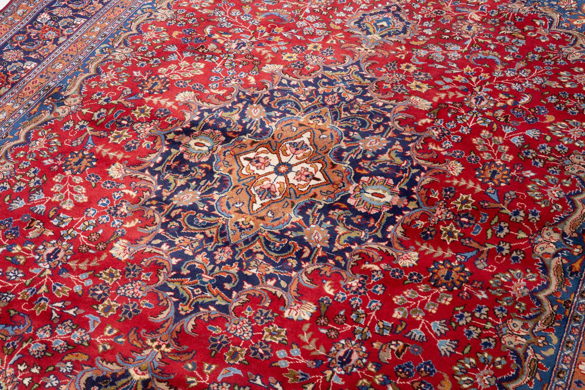 An oriental carpet, approx. 386 x 294 cm.