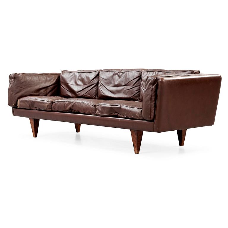 An Illum Wikkelsø three seated brown leather sofa, Michael Laursen, Denmark 1960's.