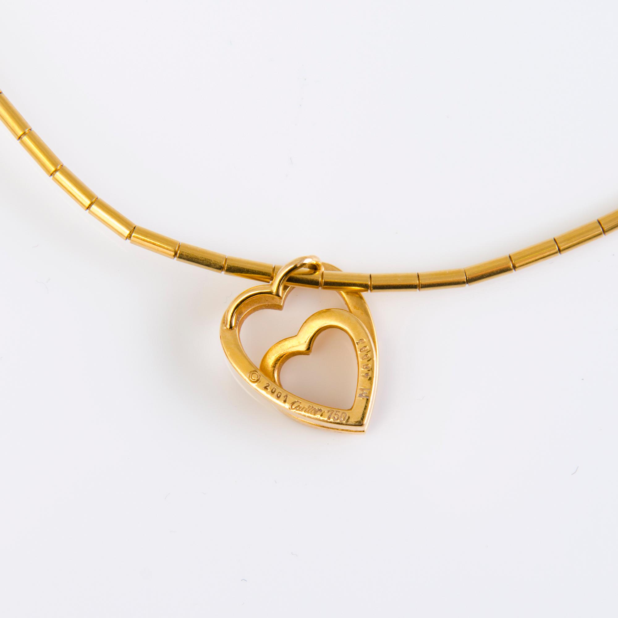A Cartier 18K gold necklace with heart pendant 1999 and 2001. Certificat and original box.