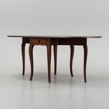 A stained pine gate-leg table, Åmells möbler.