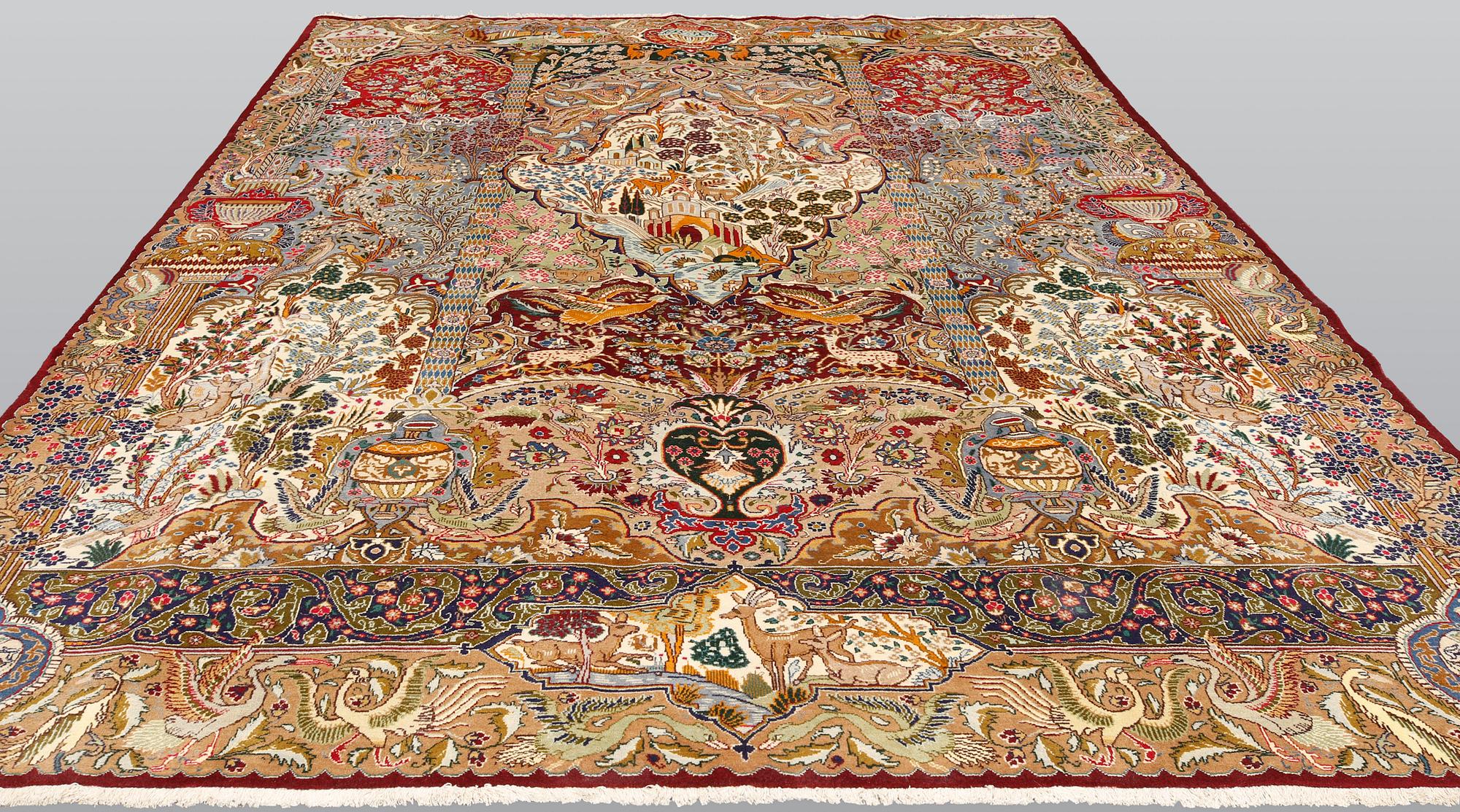 A Kashmar carpet, approx. 400 x 300 cm.