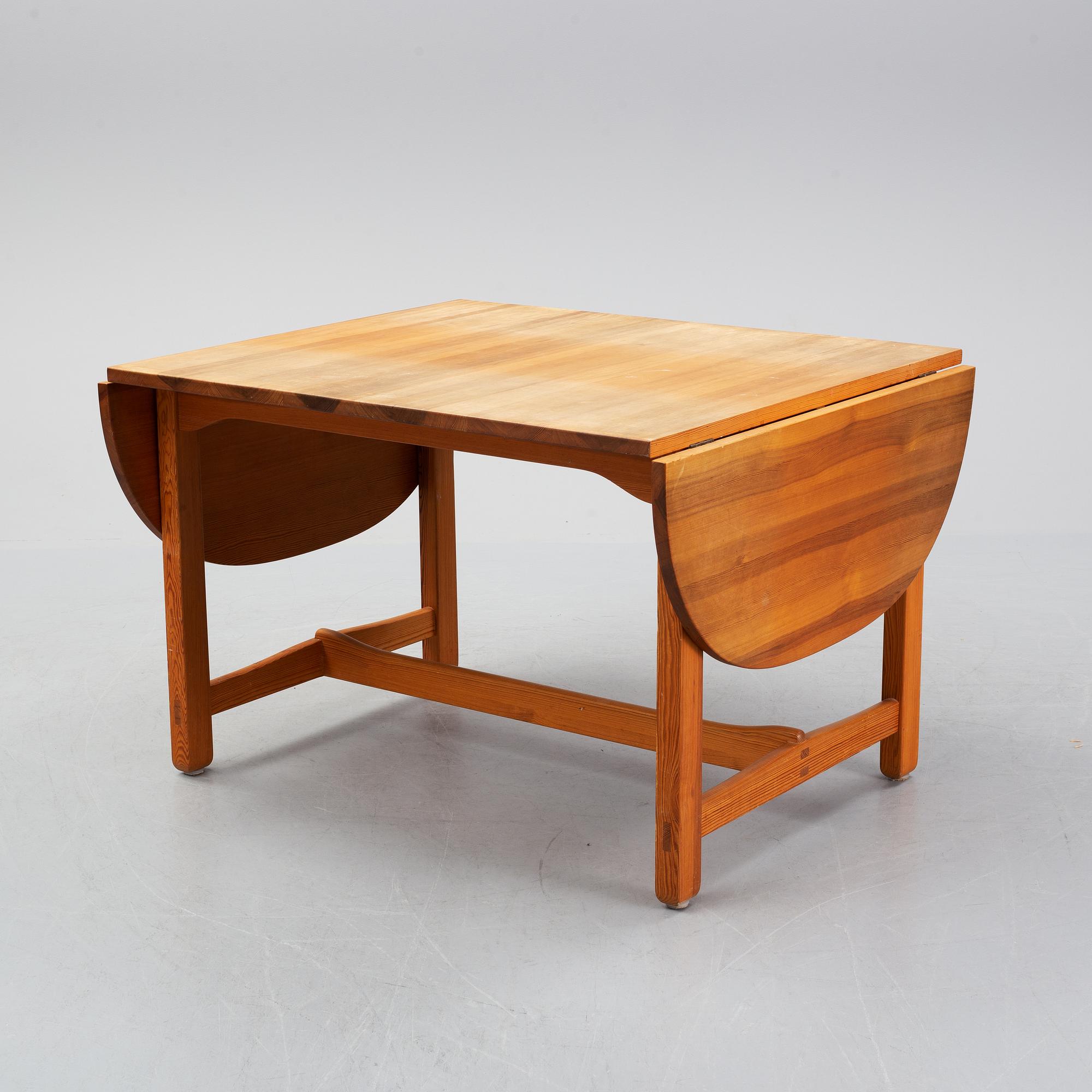 Carl Malmsten, a pine dining table and 6 chairs.