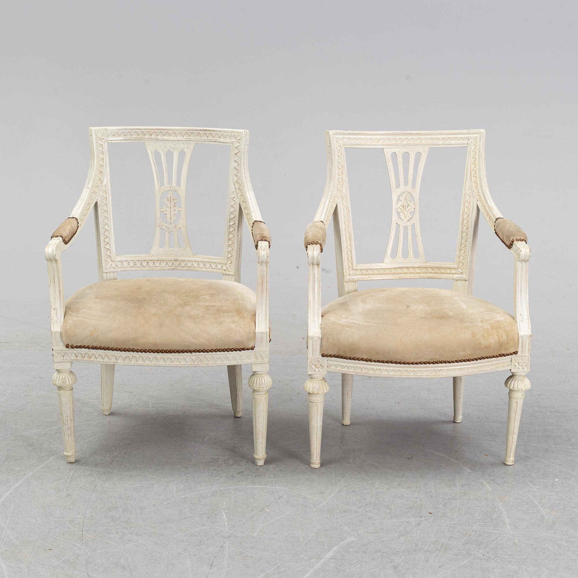 A set of two Gustavian arm chairs from the early 19th Century.