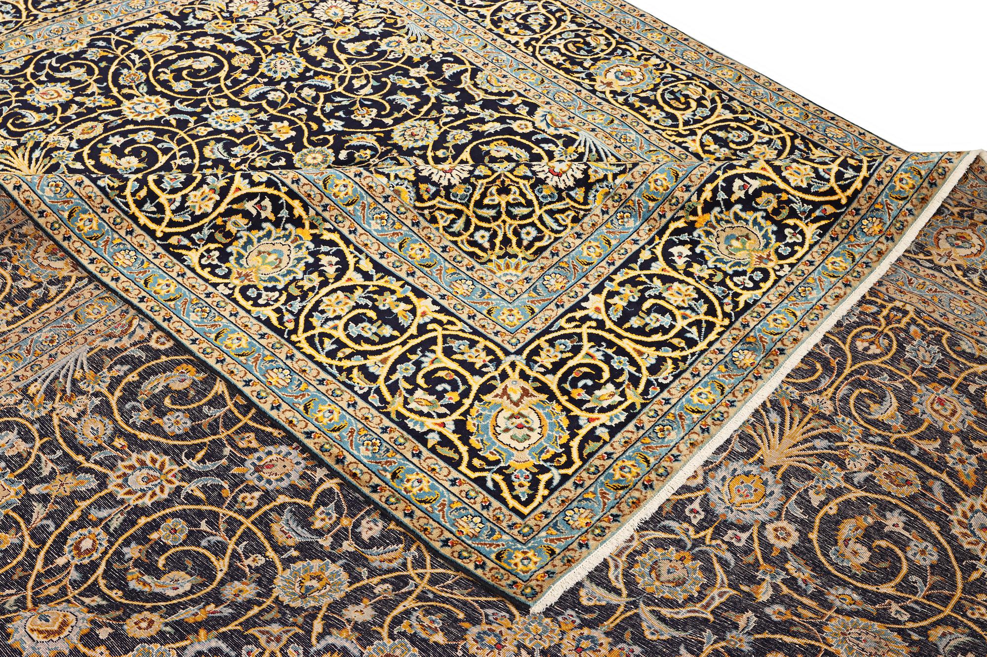 A Kashan carpet, a. 420 x 309 cm.