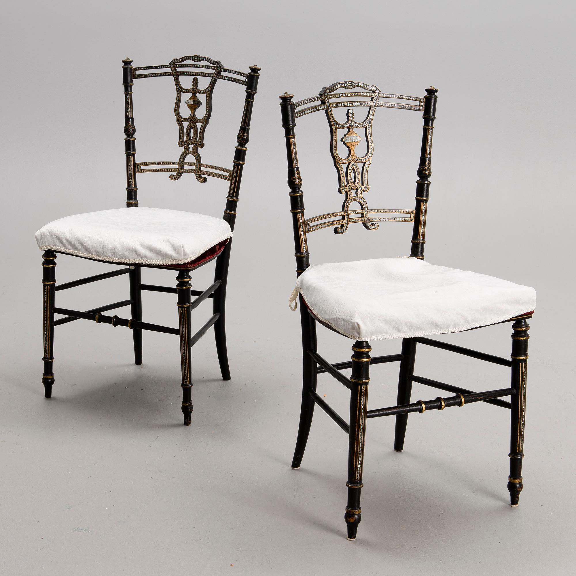 A pair of late 19th century Chinese chairs.