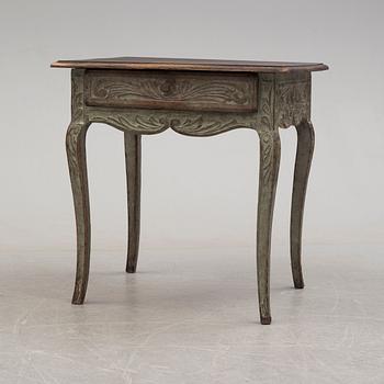 A french rococo-style table, 19th century.