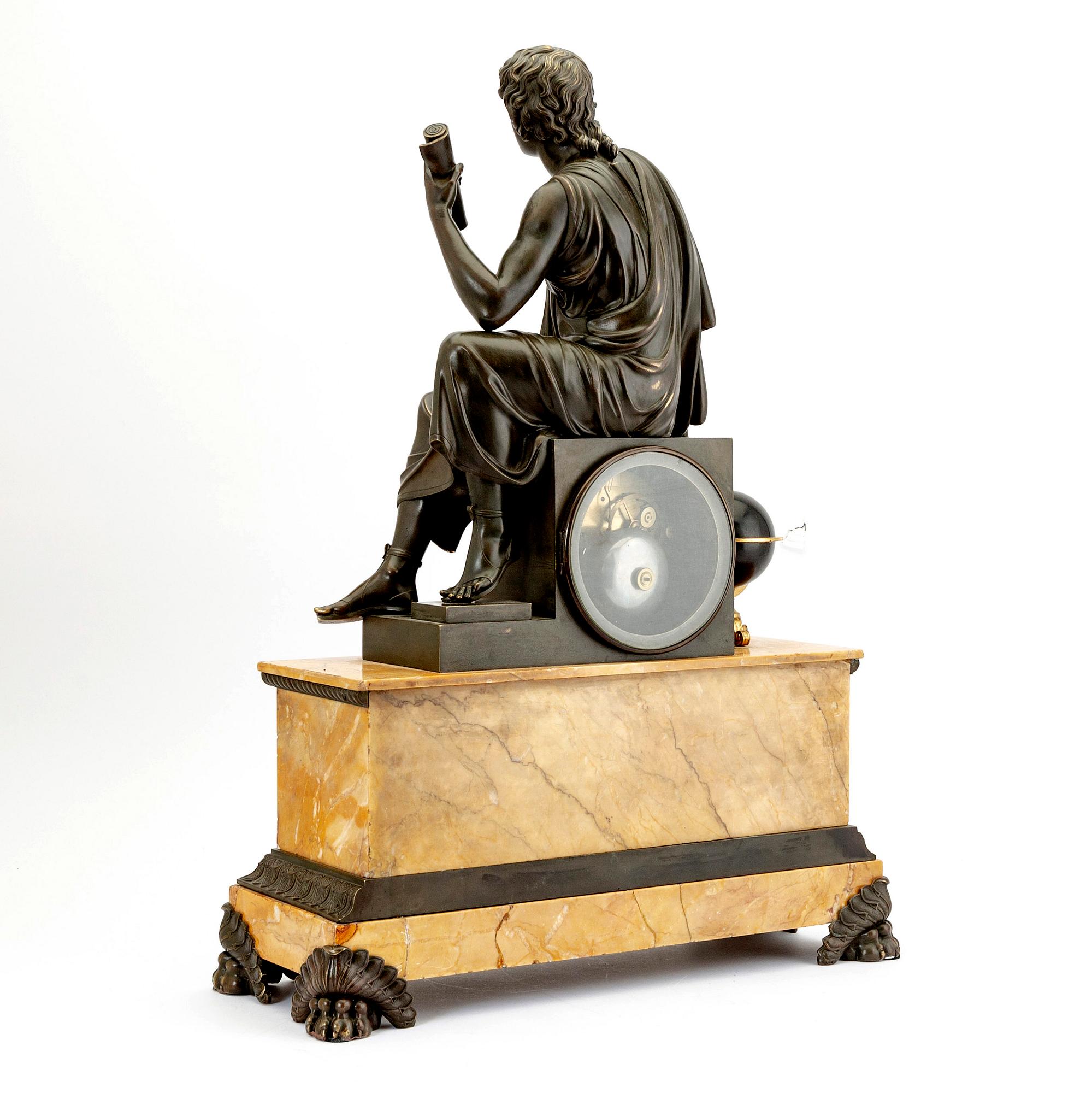 A late Empire mid 1800s table clock.