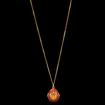 A PENDANT, 88 gilt silver, enamel. Russia early 1900 s.
14K gold chain, 42 cm, of later date.