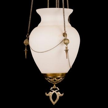 An early 20th Century opaline glass and brass ceiling light.