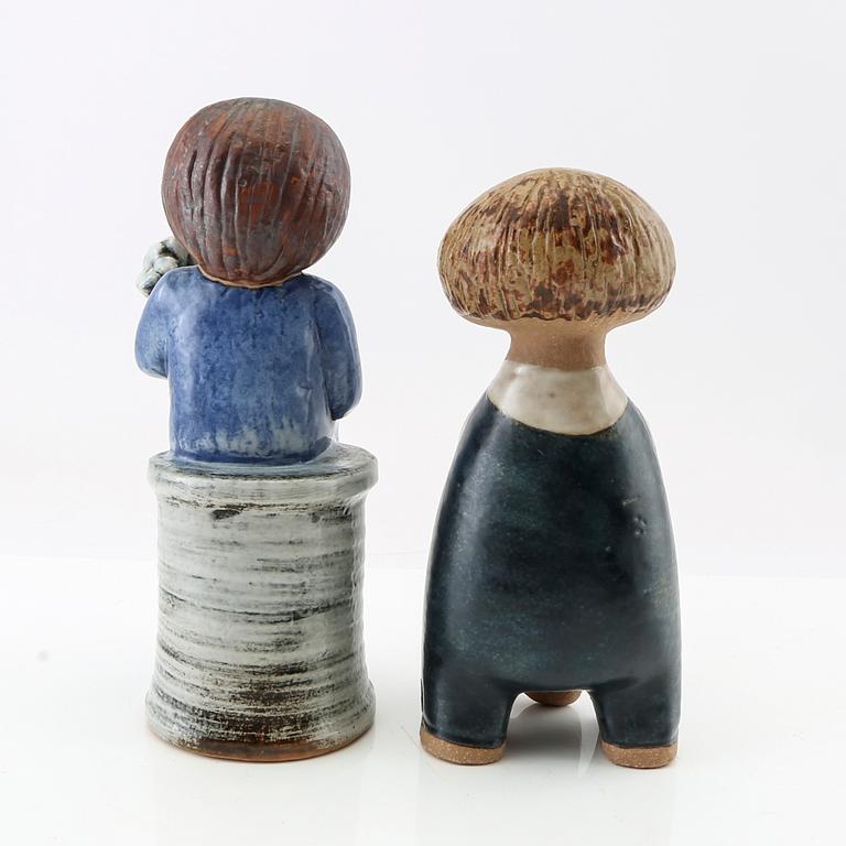 Lisa Larson, two figurines "Blomsterflicka" and "Pelle", Gustavsberg glazed stoneware.