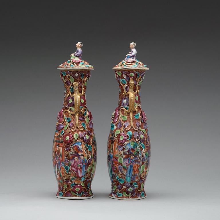 A pair of famille rose vases with covers, Qing dynasty, Qianlong (1736-95).