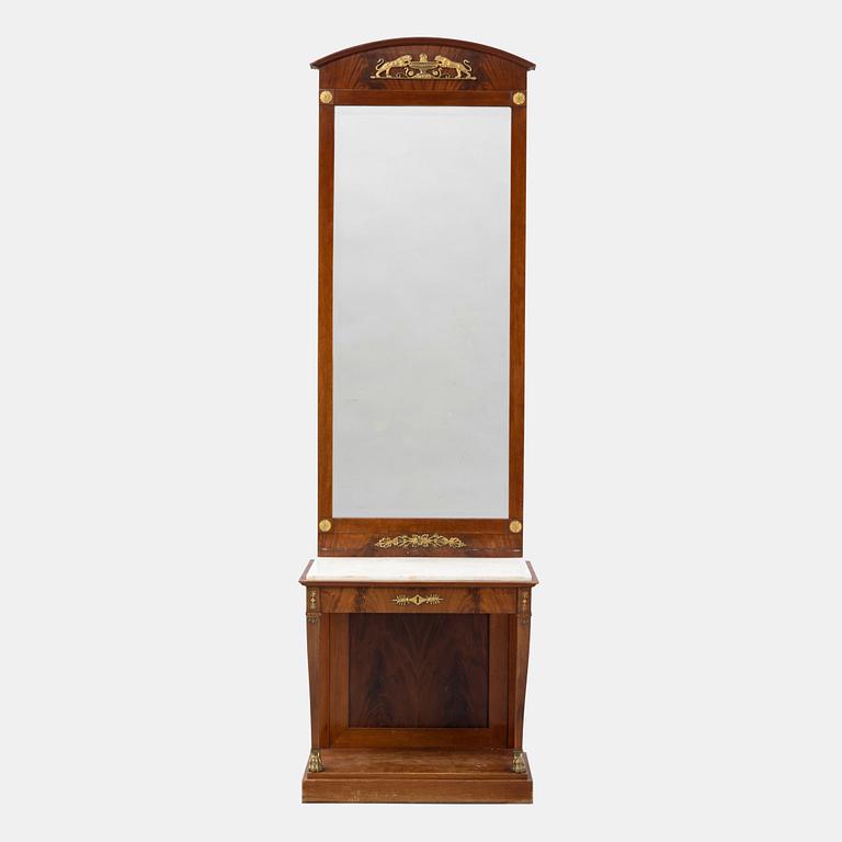 An Empire-style mirror with console table from the early 20th century.