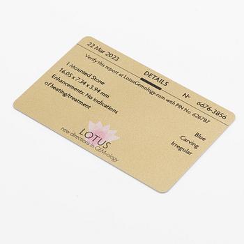 Pendant, 18K gold with carved sapphires, white sapphire, and a small rose-cut diamond.