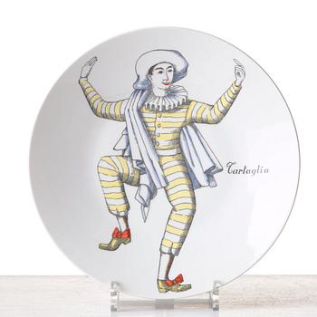 Piero Fornasetti, a set of 12 "Maschere Italiane" porcelain plates, Milan, Italy.