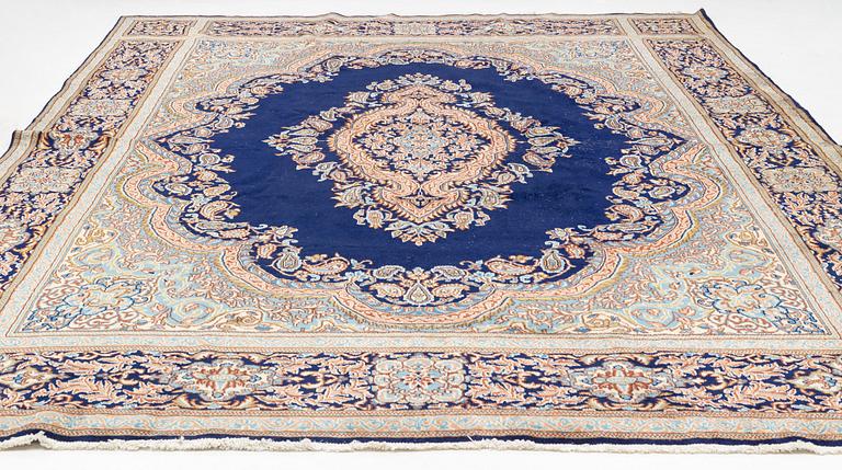 A Kerman carpet, circa 403 x 301 cm.