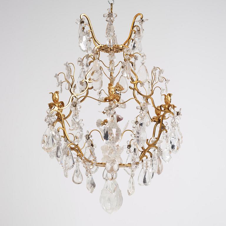 A French Louis XV-style six-branch gilt-bronze, rock crystal and amethyst chandelier, 19th century.