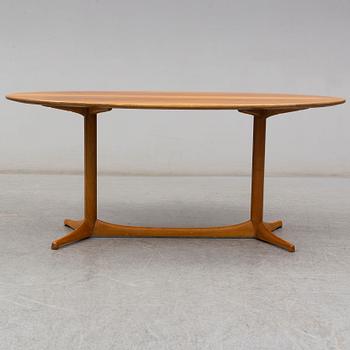 A 1959 'Plommonet' walnut coffee table by Kerstin Hörlin-Holmquist for Nordiska Kompaniet.