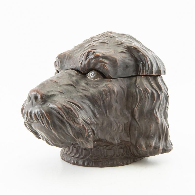 Tobacco tin, early 20th century.