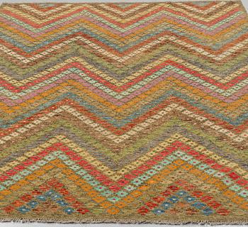 A CARPET, kilim, ca 306 x 207 cm.